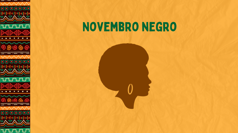 Fundo amarelo. À esquerda, elementos étnicos compõem uma borda. Ao centro, lê-se Novembro Negro, juntamente há uma silhueta marrom de uma mulher com cabelo afro.
